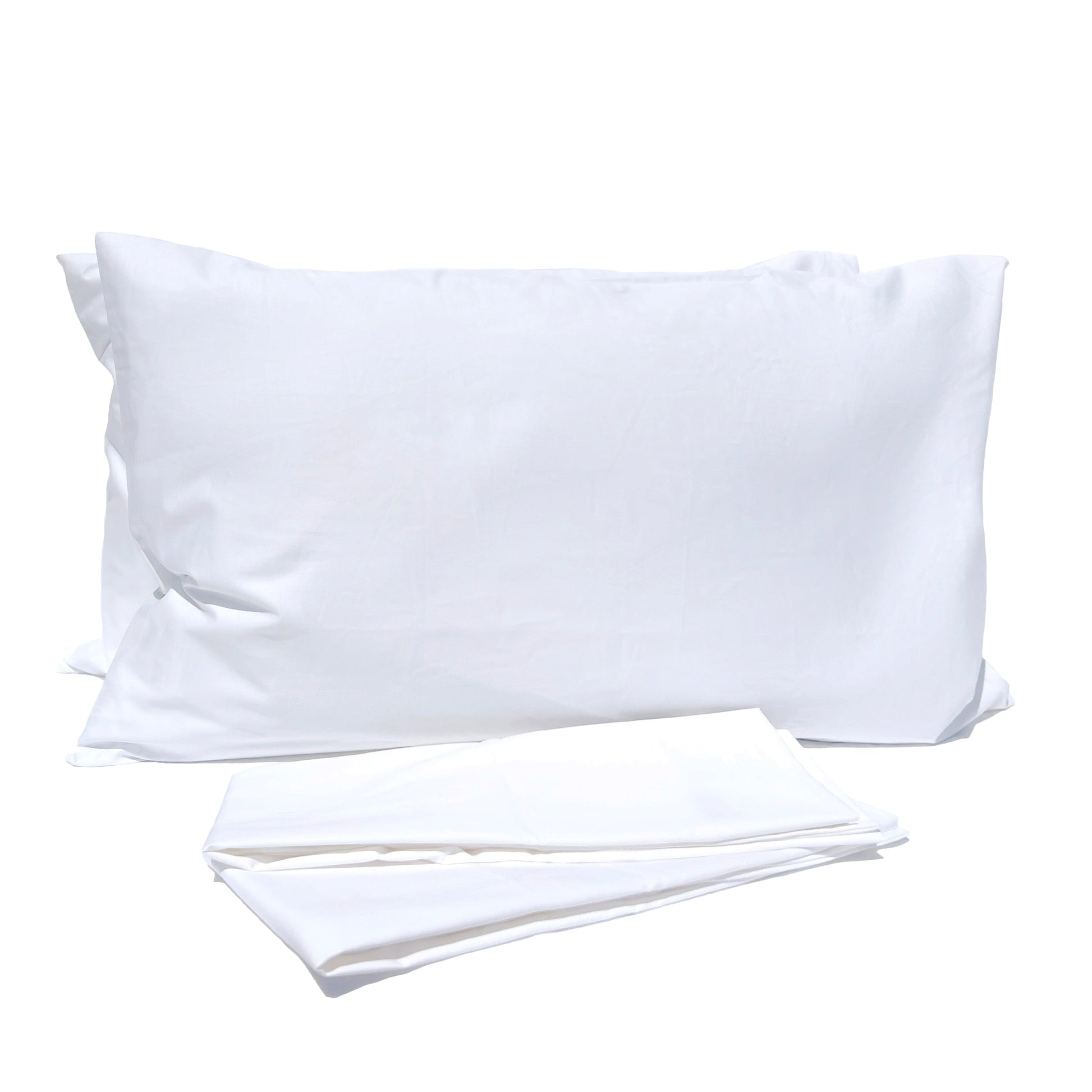 A white Pillowtex pillowcase and a white sheet made of a Cotton Polyester blend fabric on a white surface.