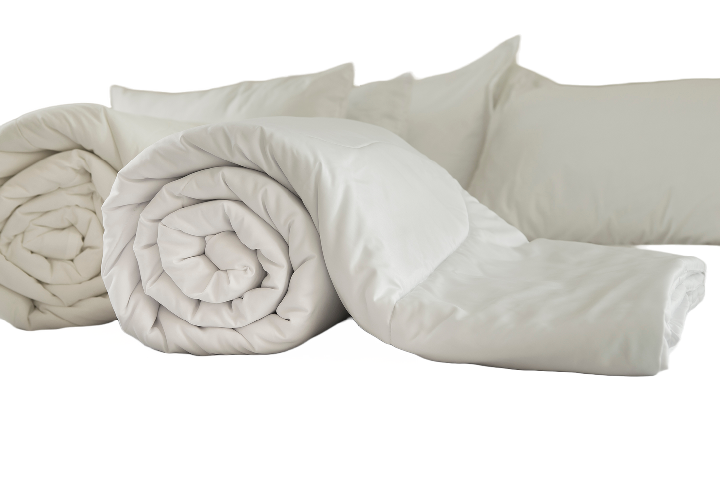 A set of white Down Dreams Asheville Down Comforters and pillows on a white background made with Manchester Mills Cotton Barrier Weave Fabric.