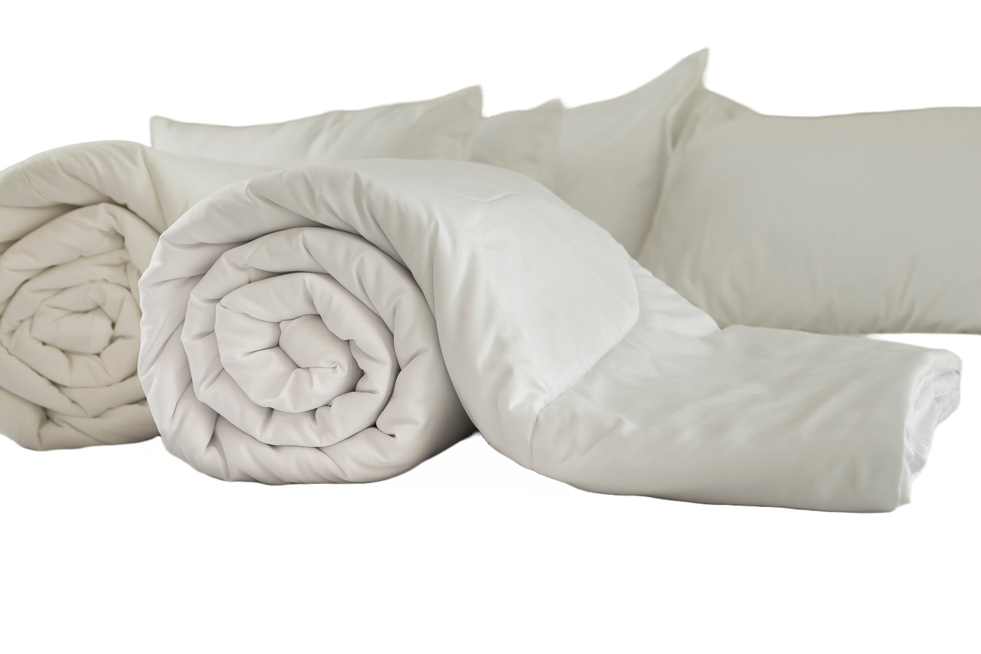 A set of white Down Dreams Asheville Down Comforters and pillows on a white background made with Manchester Mills Cotton Barrier Weave Fabric.